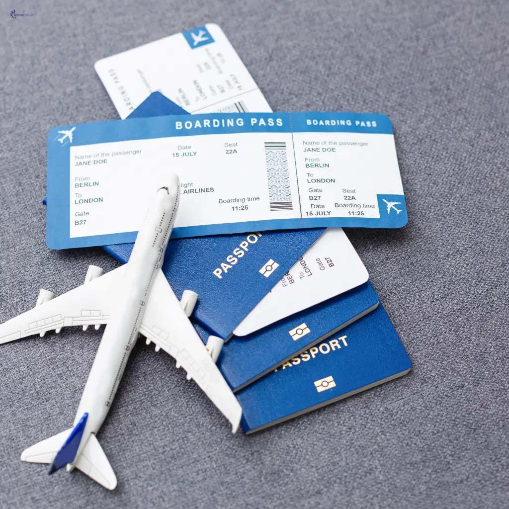 A set of boarding passes and passports for an airline flight.