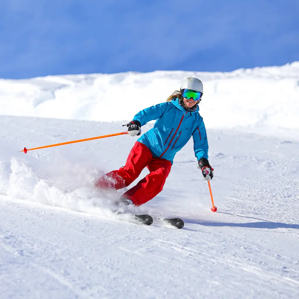 A lady enjoying skiing in France.