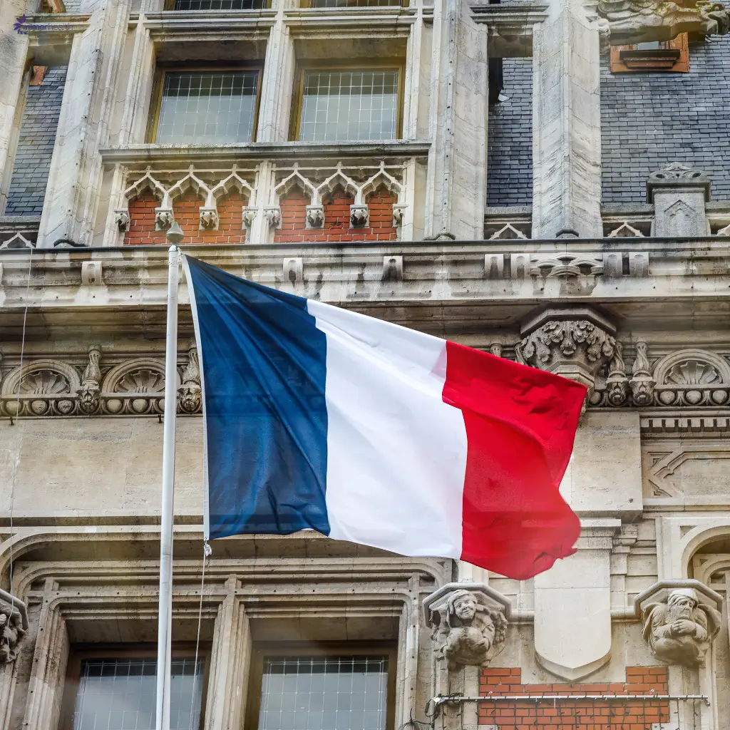 The flag of France waving in the air.