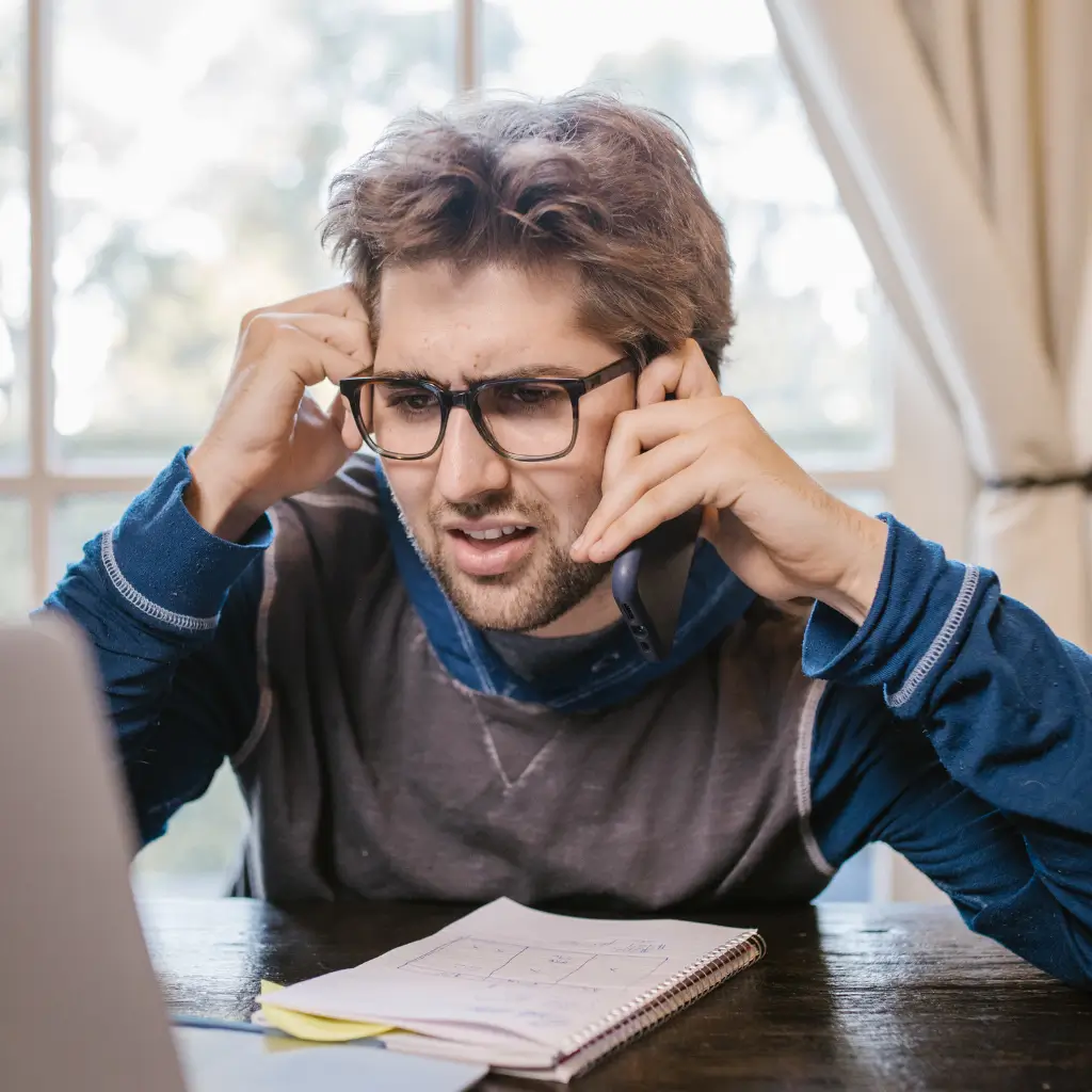 Man looking confused as to why spanish visa medical certificate was rejected by the Spanish consulate, because his passport number was missing - he will now apply with Wilmer Health