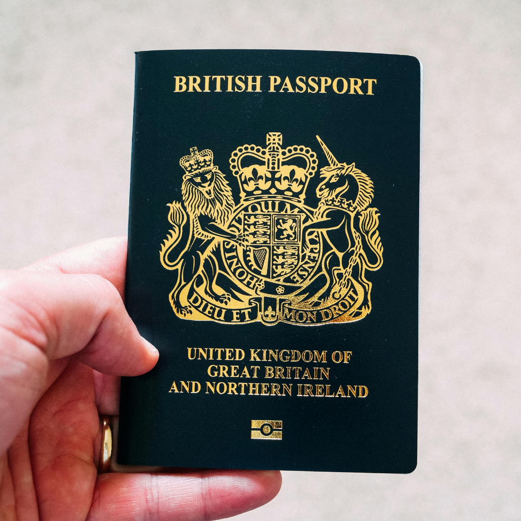 A person applying for a online spanish visa medical certificate with Wilmer Health and adding image of passport to the secure application form