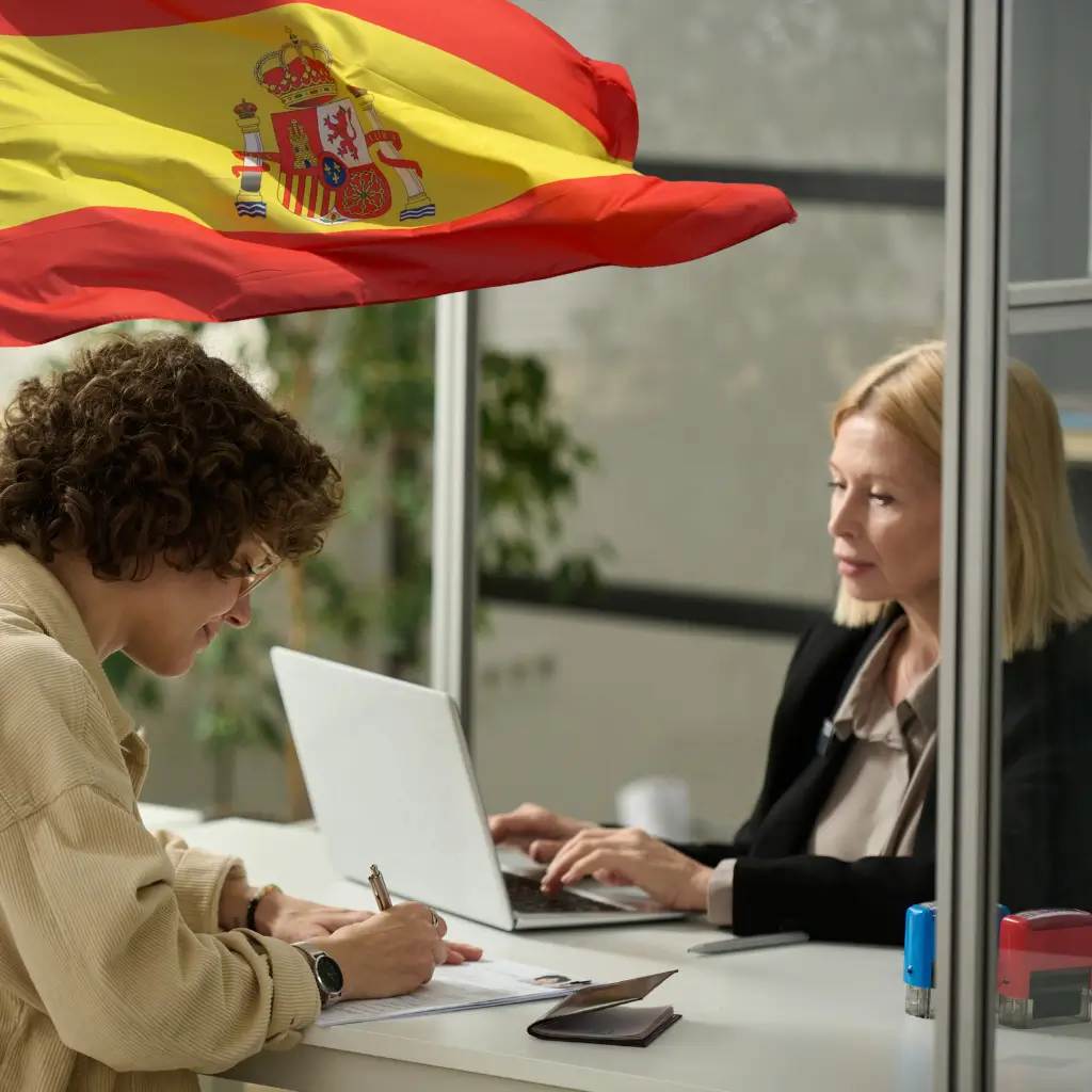 A woman at her soanish consulate appointment and presenting her spanish visa medical certificate issued by Wilmer Health